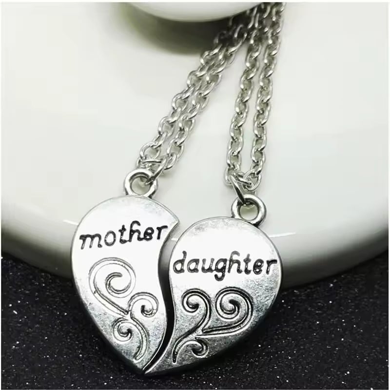 moeder dochter ketting hartje licht